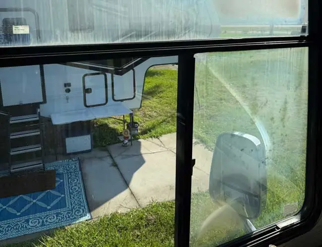 Close up of a foggy RV window in need of repair in Florida
